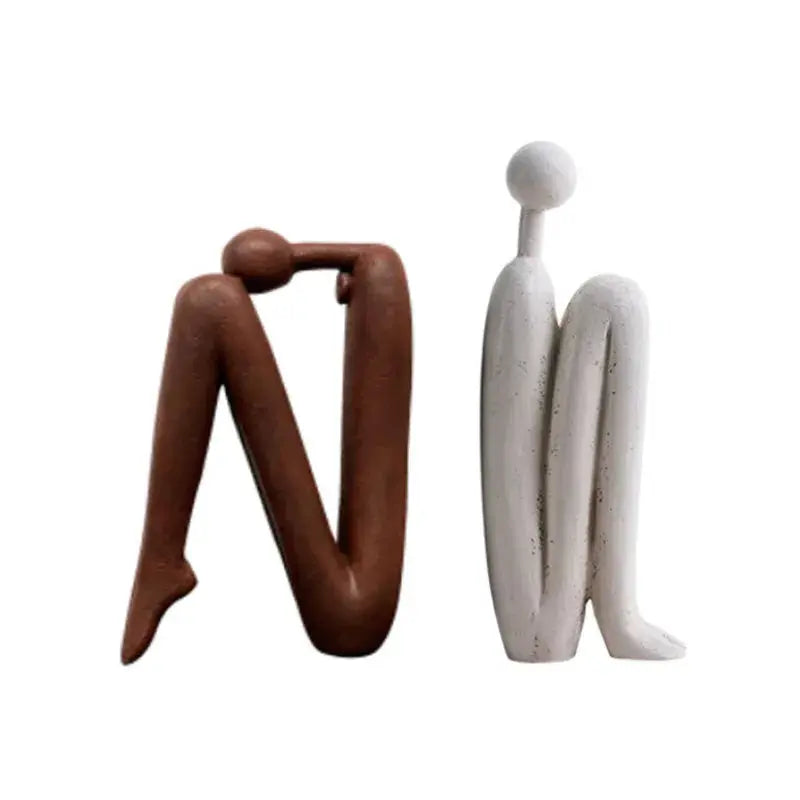 Aparador de Livros Minimalista com Esculturas Humanas Abstratas Amaritta