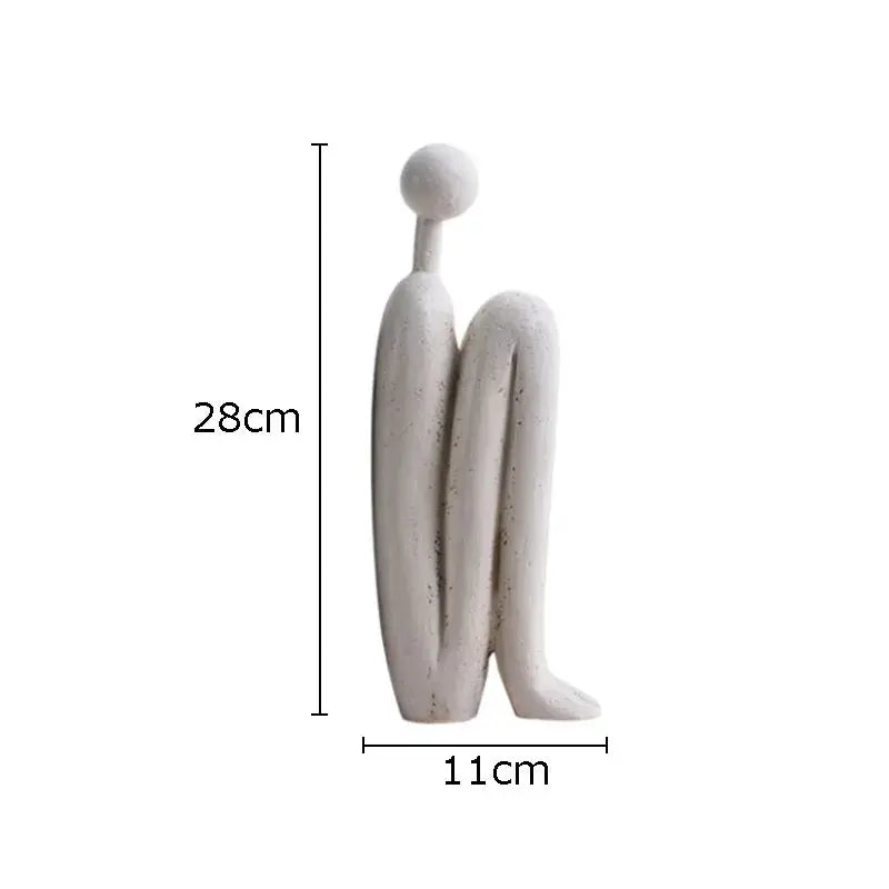 Aparador de Livros Minimalista com Esculturas Humanas Abstratas Amaritta