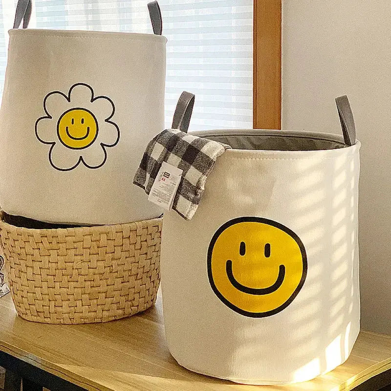 Cesto de Lavanderia de Pano com Alças e Estampa Carinha Feliz Casamarella