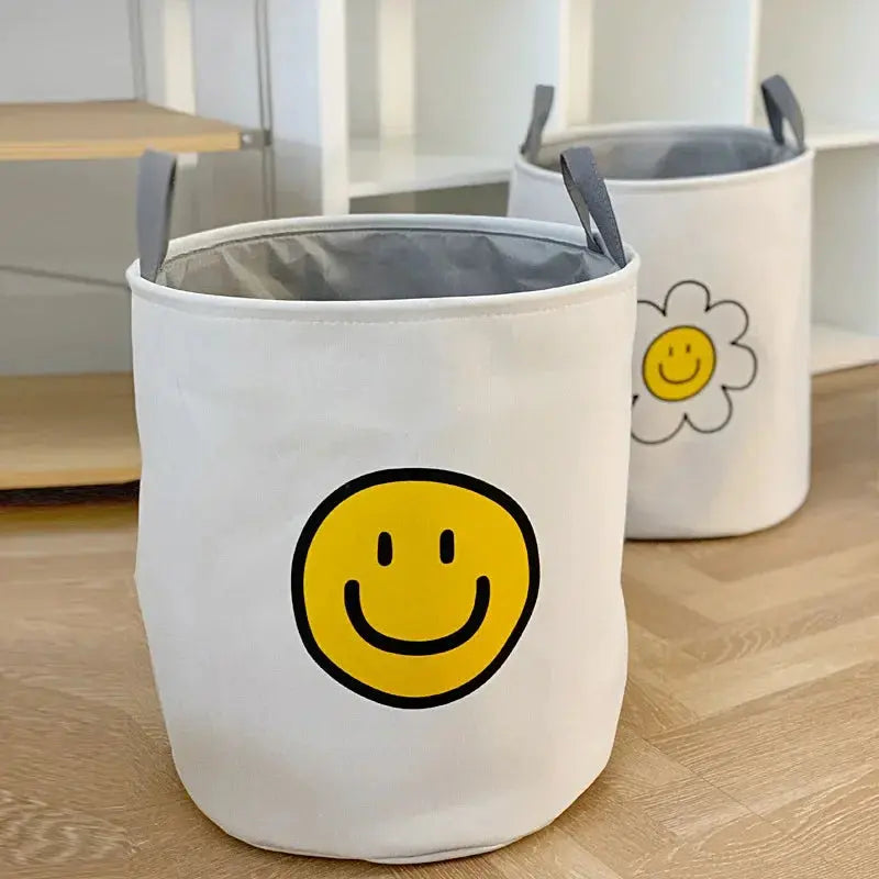 Cesto de Lavanderia de Pano com Alças e Estampa Carinha Feliz Casamarella