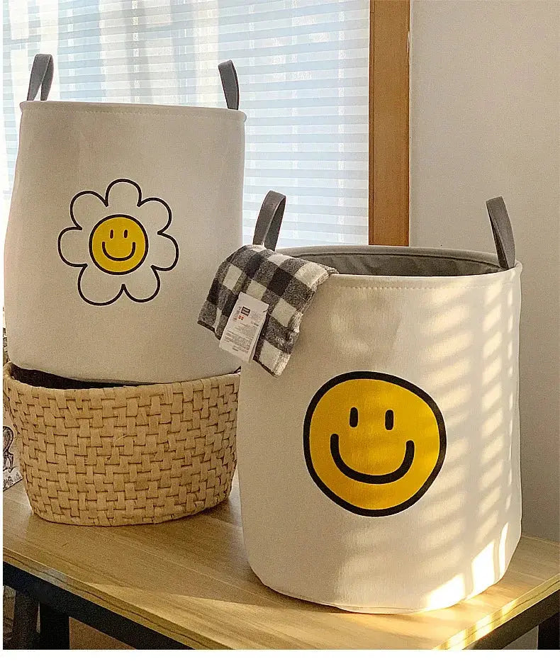 Cesto de Lavanderia de Pano com Alças e Estampa Carinha Feliz Casamarella