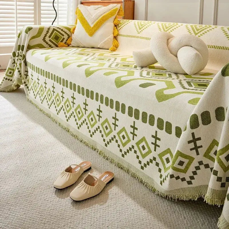Cobertor decorativo boho com estampa geométrica e borlas