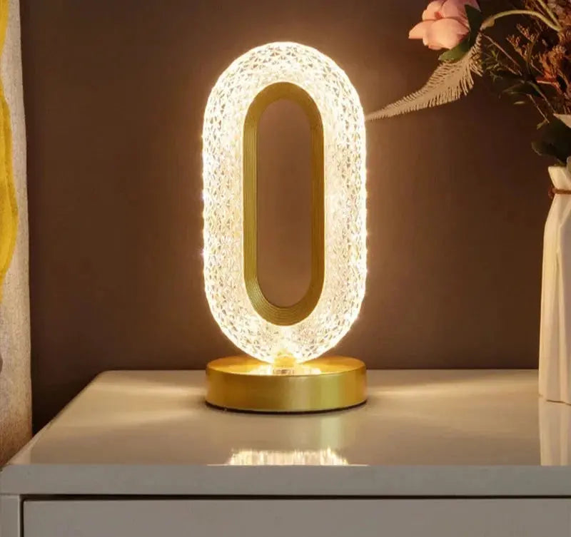 Luminária de Cabeceira LED Oval  de Cristal com 3 Cores Casamarella